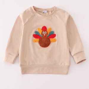 Beige turkey french knot top