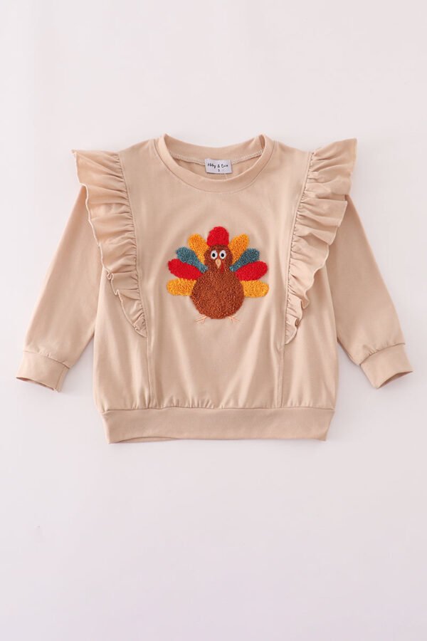 Beige turkey french knot ruffle top